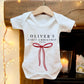 Personalised Baby's First Christmas Bow Baby Grow