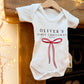 Personalised Baby's First Christmas Bow Baby Grow