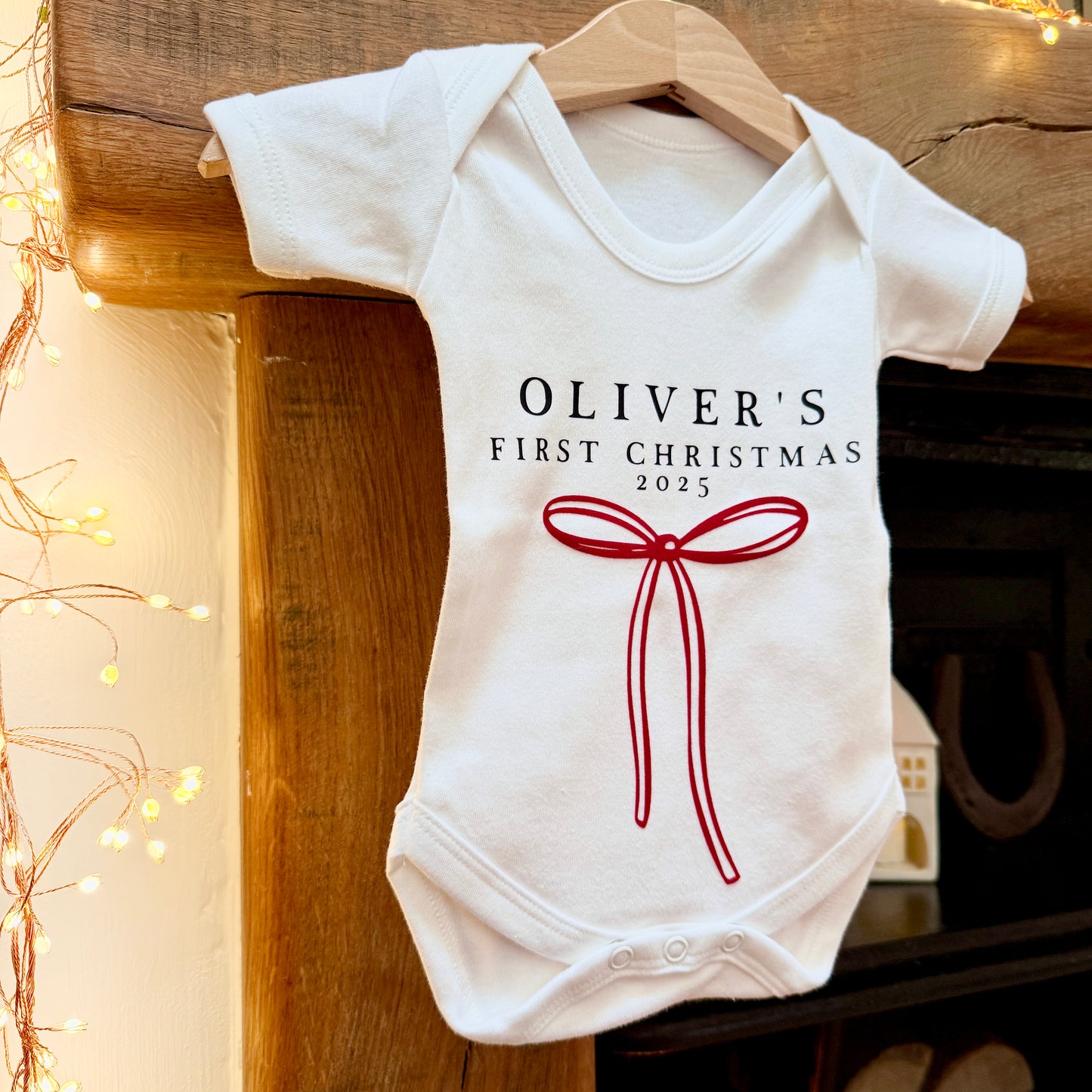 Personalised Baby's First Christmas Bow Baby Grow